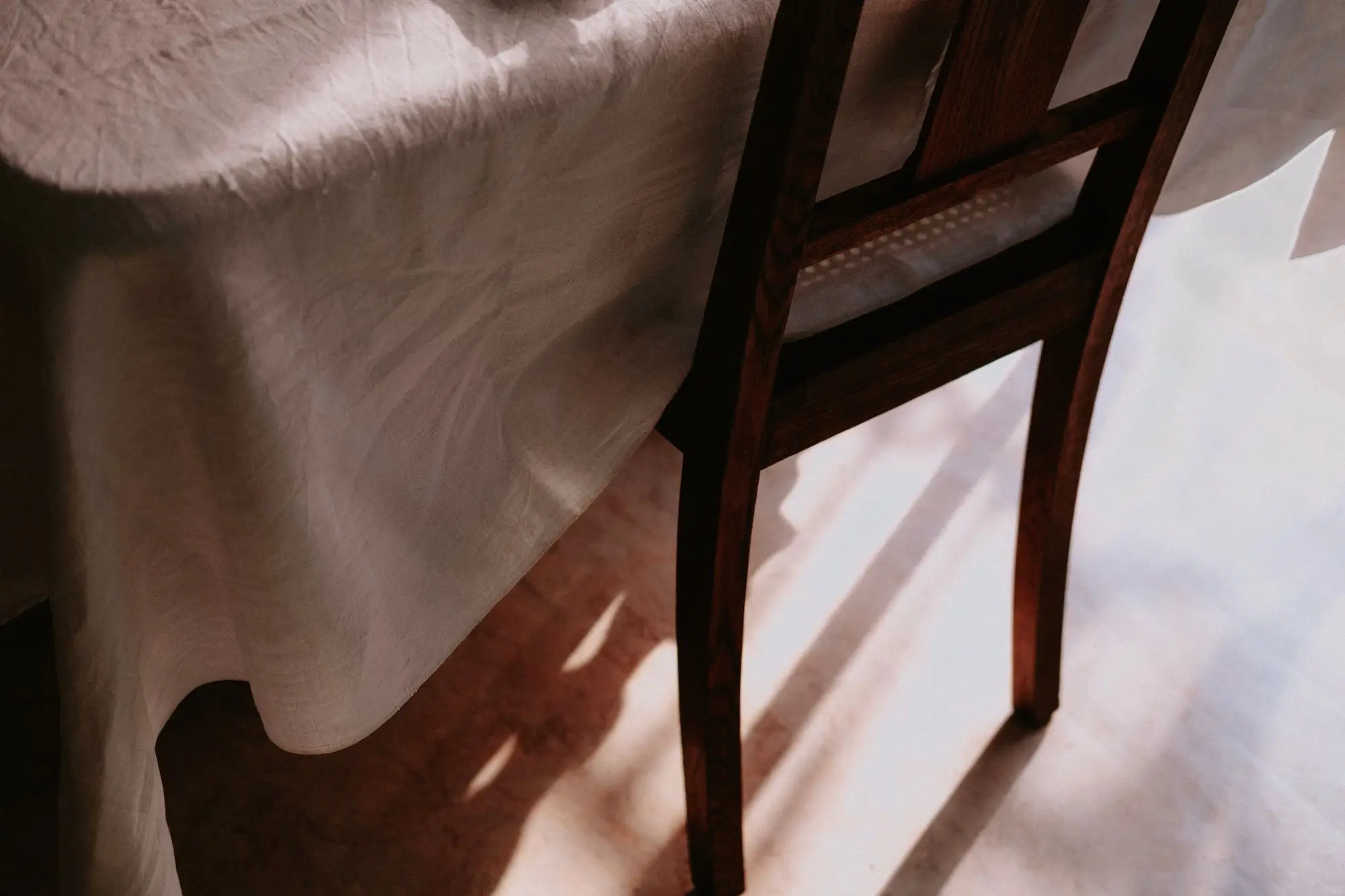 Morning sunlight falling across a wooden table.